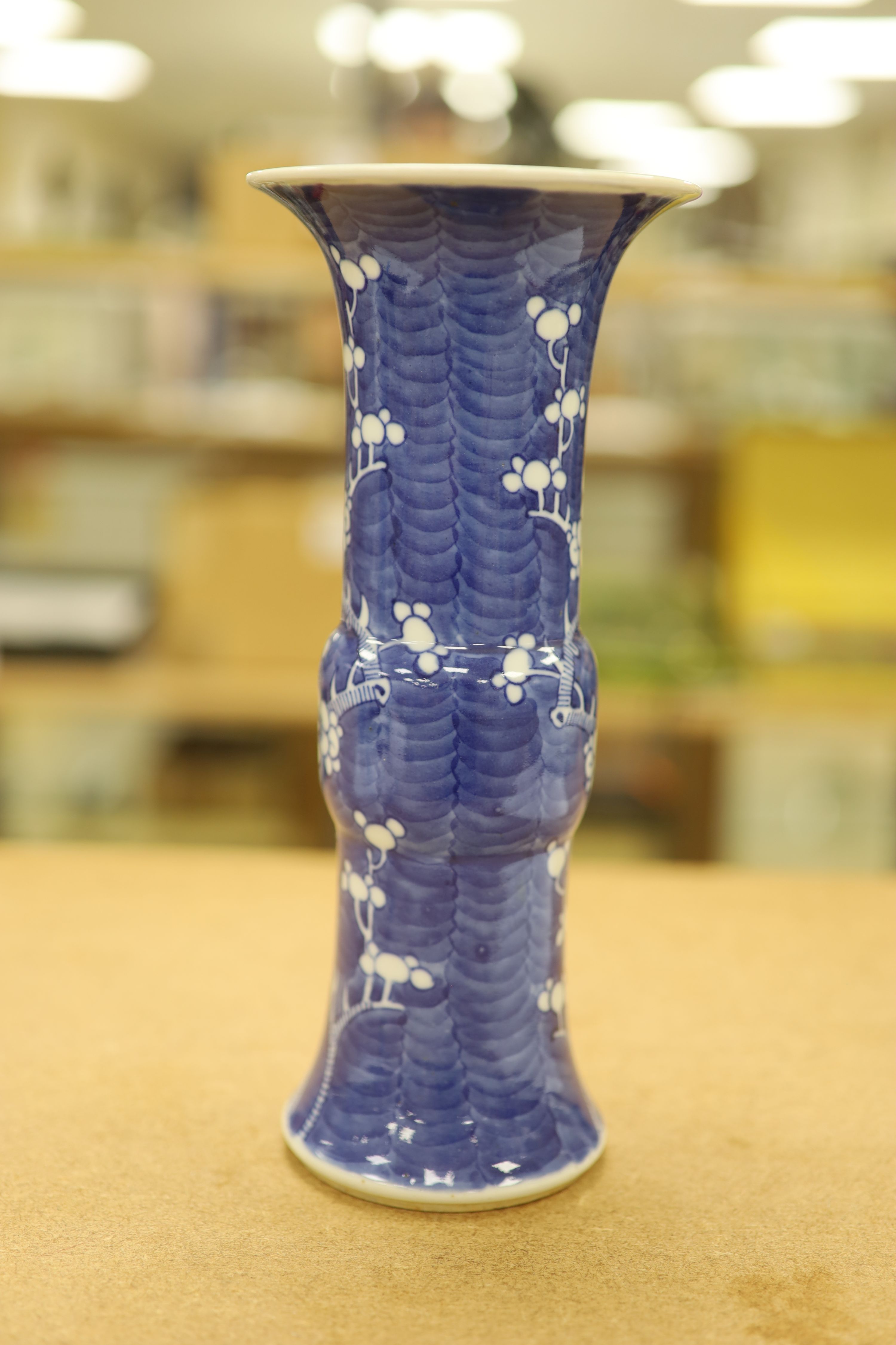A pair of late 19th century Chinese blue and white prunus vases